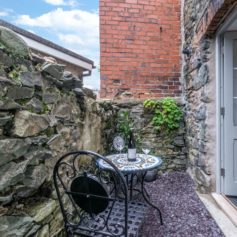 Enjoy your morning coffee out on the home's cosy terrace