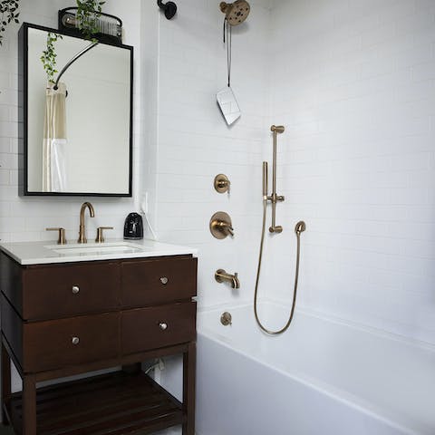 The brass fixtures in the bathroom