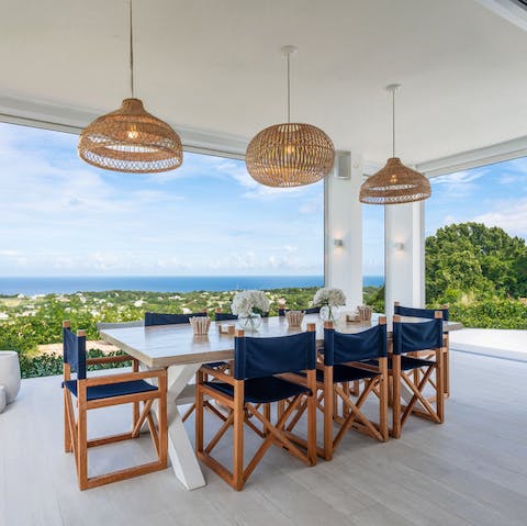 Raise a glass to the magic of island living at the outdoor dining table