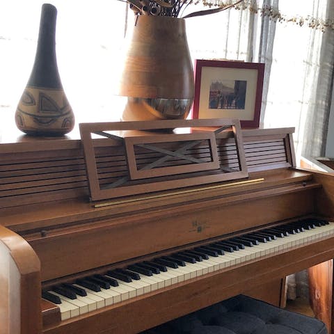 Brush up on your playing with the antique piano