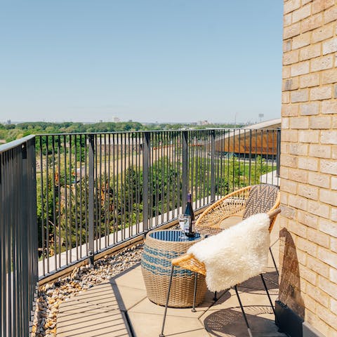 Sip a glass of wine on the living room's balcony while admiring views of the Olympic Park and the Lee Valley VeloPark
