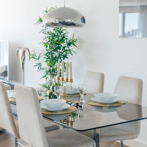 Sit down to a celebratory meal at the elegant dining table