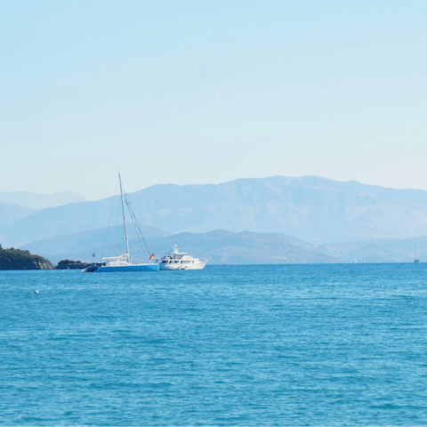 Explore the coastline of north east of Corfu by boat