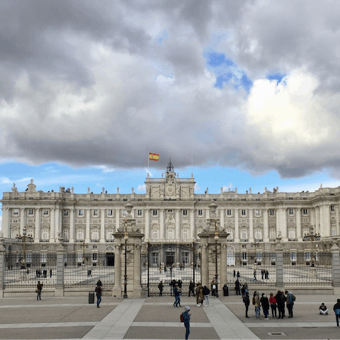 Visit the Royal Palace of Madrid, a fifteen-minute stroll from your door
