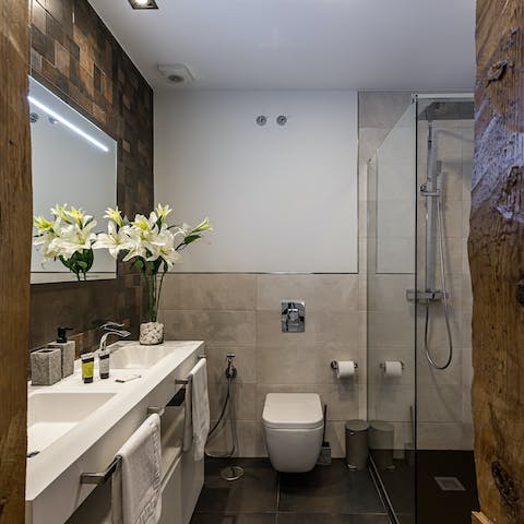Start mornings on a pampered foot with a soak under the en-suite's rainfall shower