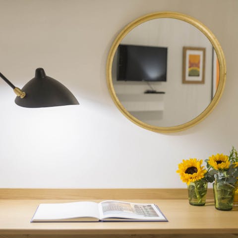 Set up a remote workspace at the desk in the bedroom, perfect for those travelling on business 