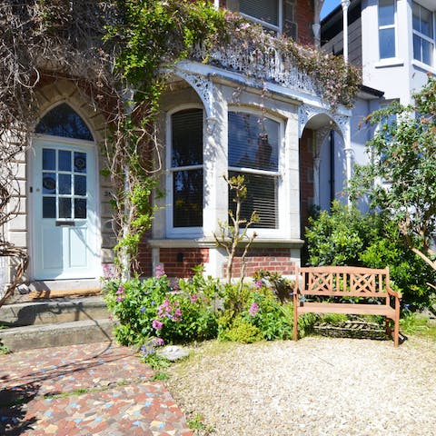 Start the day with coffee on the pretty front terrace