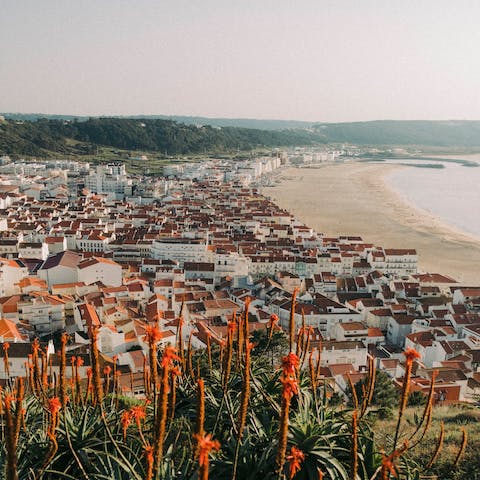 Soak up the sun from Praia de Faro, a short ferry or drive away