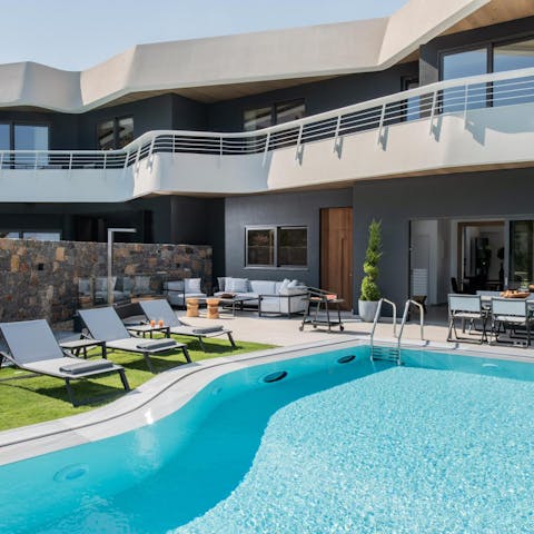 Cool off in the swimming pool in between relaxing on a sun lounger