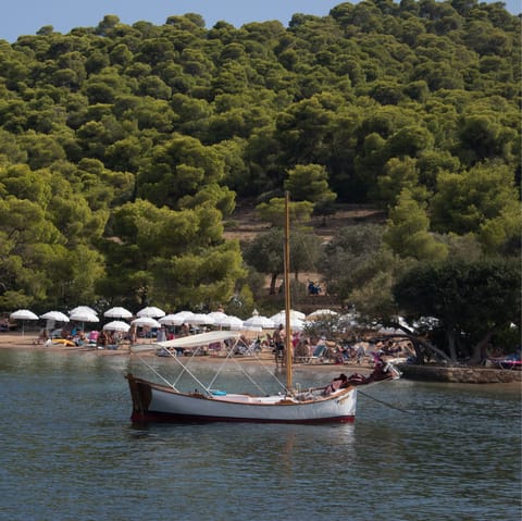 Take a ten-minute water taxi to explore the island of Spetses