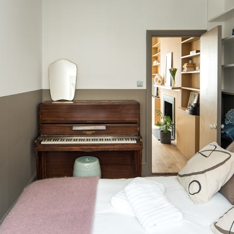 Play a song or two on the second bedroom's piano