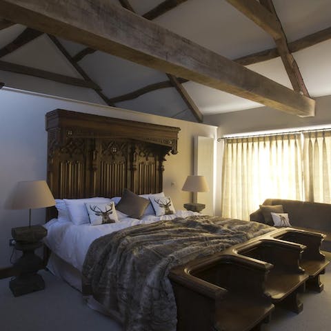 Enjoy an excellent night's sleep in the antique wooden bed