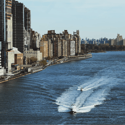 Go for a walk along the East River, just one block away 