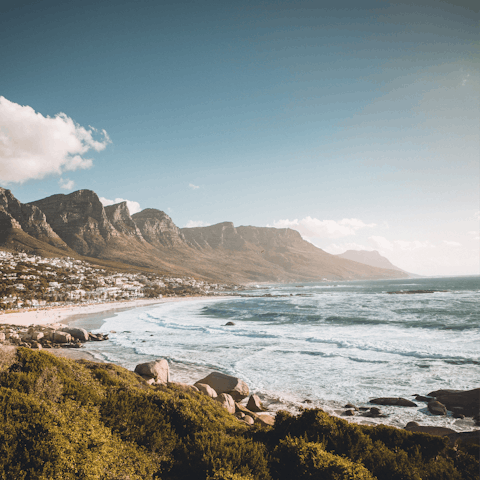 Hop on a bus down to Camps Bay Beach and spend a day by the sea