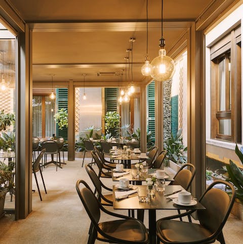Start the day with a hearty breakfast in the building's chic dining room