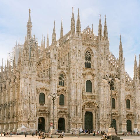 Stroll over to Duomo di Milano in eight minutes and take a guided tour