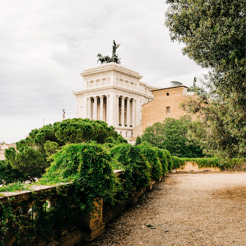 Walk a few minutes to Piazza Venezia to sip coffee and watch the world go by