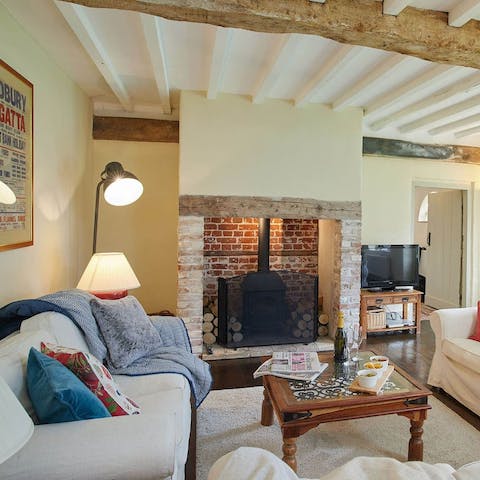 Play a board game in front of the wood-burning stove