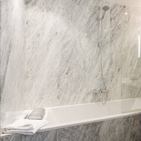 Relax in the marble-clad tub after a day of wandering Montmartre's hilly streets