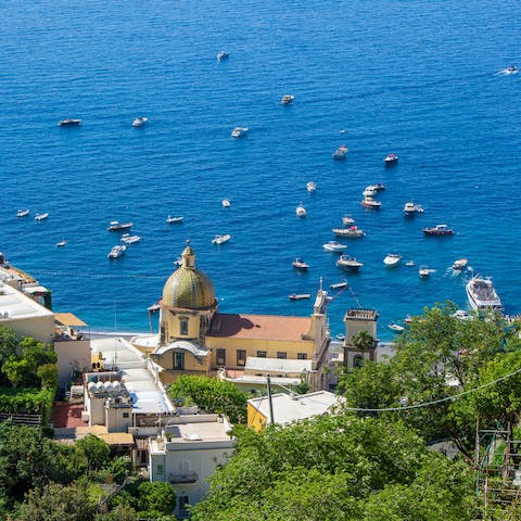 Roam around the village of Positano, where the Chiesa di Santa Maria Assunta awaits