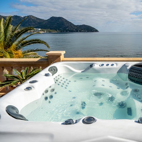 Enjoy a soak with a view in the sea-facing hot tub