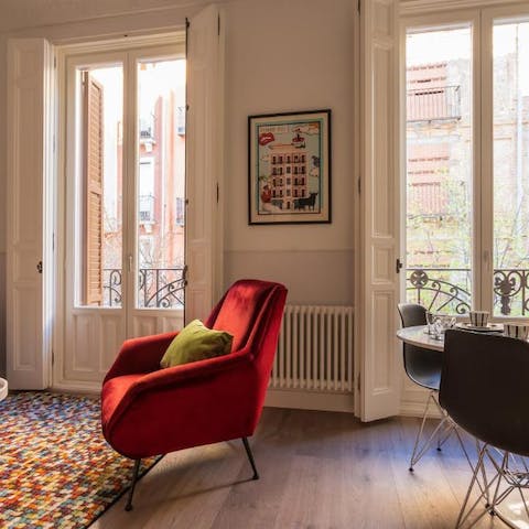 Open up the French-style doors and watch the street from Juliet balconies