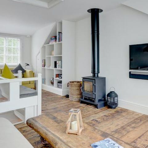 Huddle by the wood-burning stove on chilly days