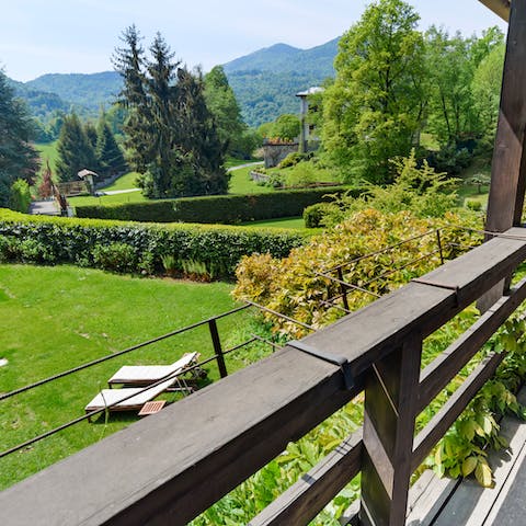 Admire the views across the mountains of Lombardy from the balcony
