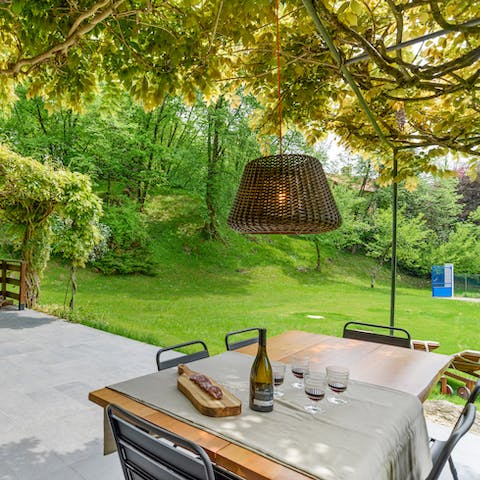 Open a bottle of Italian wine and sit on the covered terrace