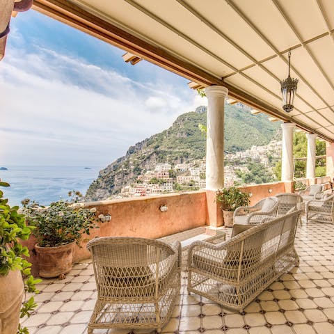 Soak up views over the Mediterranean Sea with an Aperol Spritz in hand
