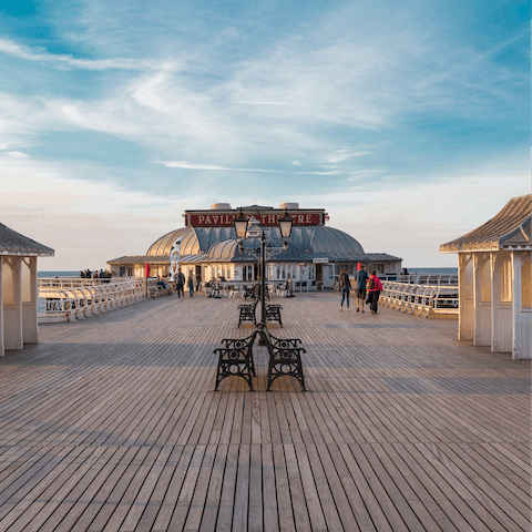 Visit the stunning Grade II-listed Victorian pier at Cromer,  a ten-minute drive away