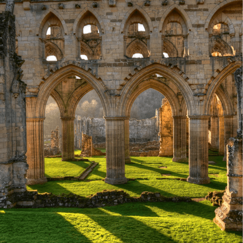 Take a thirty minute drive to the ruins of Rievaulx Abbey