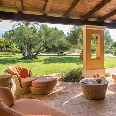 Enjoy an aperitif on the covered terrace