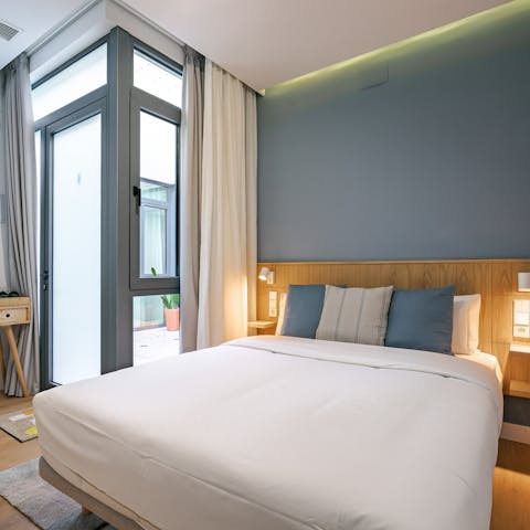 Sink into a comfy bed at the end of a busy day in the city