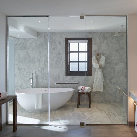 Enjoy a relaxing and rejuvenating soak in the freestanding bathtub
