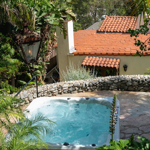 Unwind in the hot tub in the tranquil garden