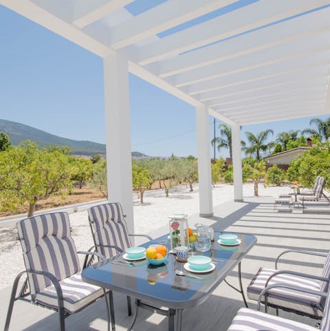 Enjoy alfresco breakfasts in the dappled shade of your veranda terrace