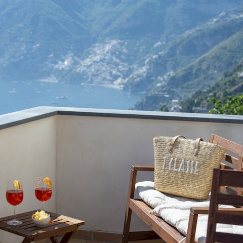 Sip cocktails and enjoy the ocean views from the balcony