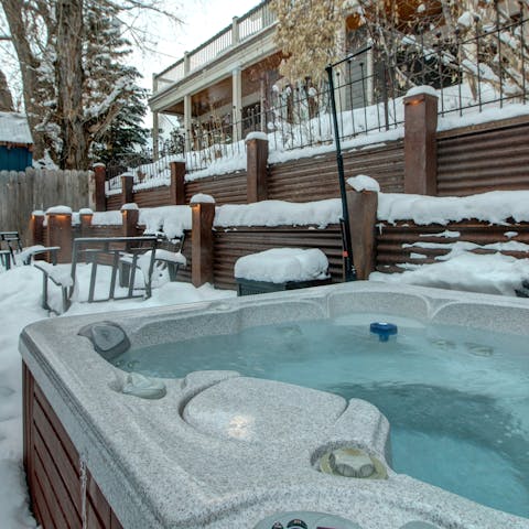 Brave the elements in the outdoor hot tub