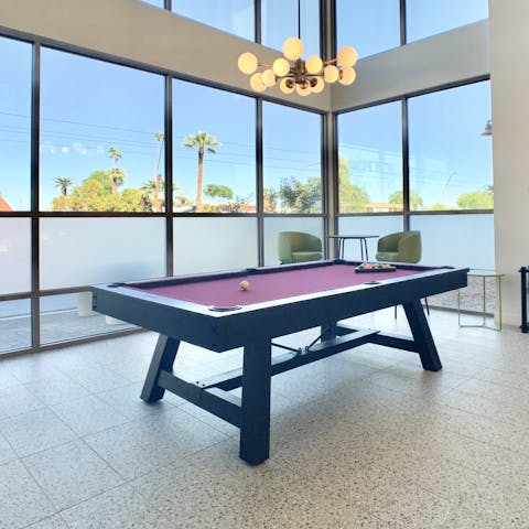 Play a few games of pool in the guest lounge