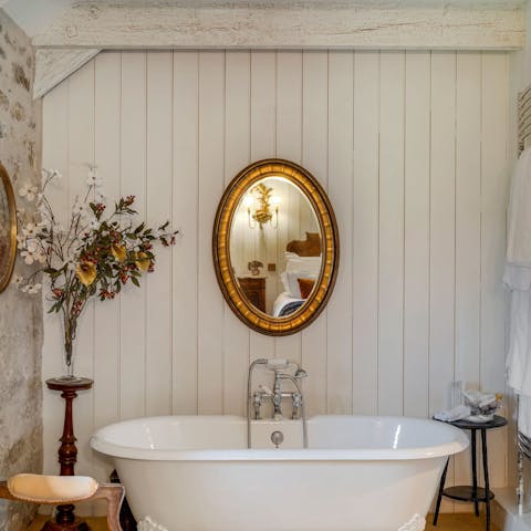 Relax in the in-room roll-top bath after a busy day outdoors