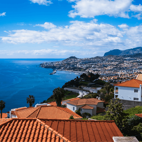 Enjoy scenic views across Madeira's capital city of Funchal, ten minutes away