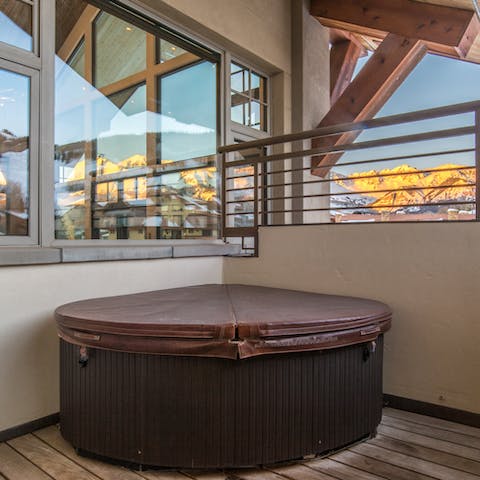 Sit back in the hot tub and take in the views 