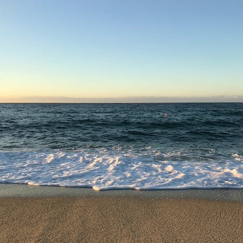 Grab your beach essentials and drive down to Playa de Guadalobón 