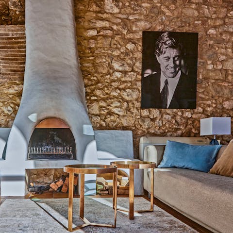 On cooler nights, cosy up by the fire under the watchful gaze of Robert Redford