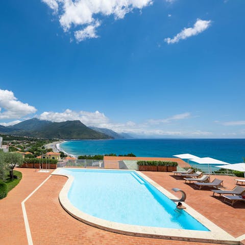 Jump into the building's swimming pool and admire the Mediterranean scenery