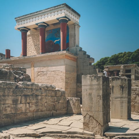 Visit the ancient Knossos Palace, a twenty-minute drive away