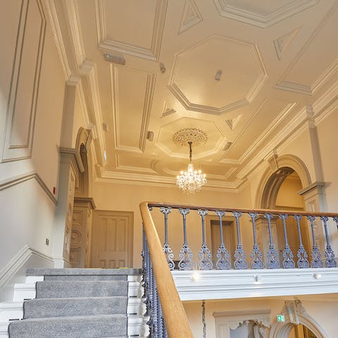 Arrive in style and head up the stairs to the majestic entrance to the apartment