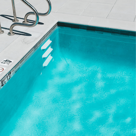 Start the day with a swim in the building's shared swimming pool