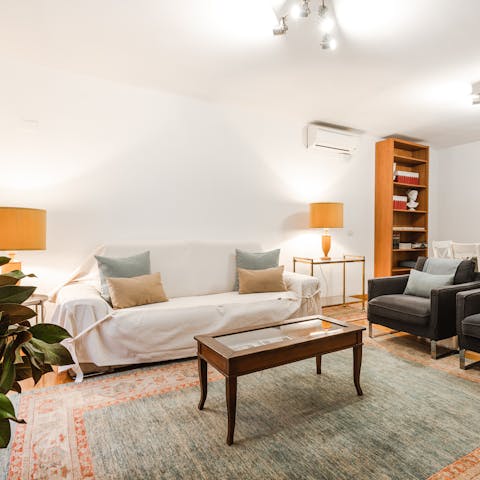 Put your feet up in the living space with a glass of red after a busy day